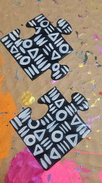 Load image into Gallery viewer, Peculiar Puzzle Piece Earrings

